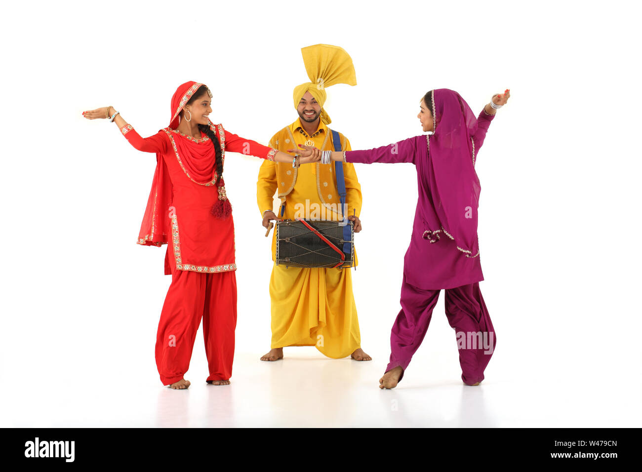 Dancers performing folk dance Stock Photo