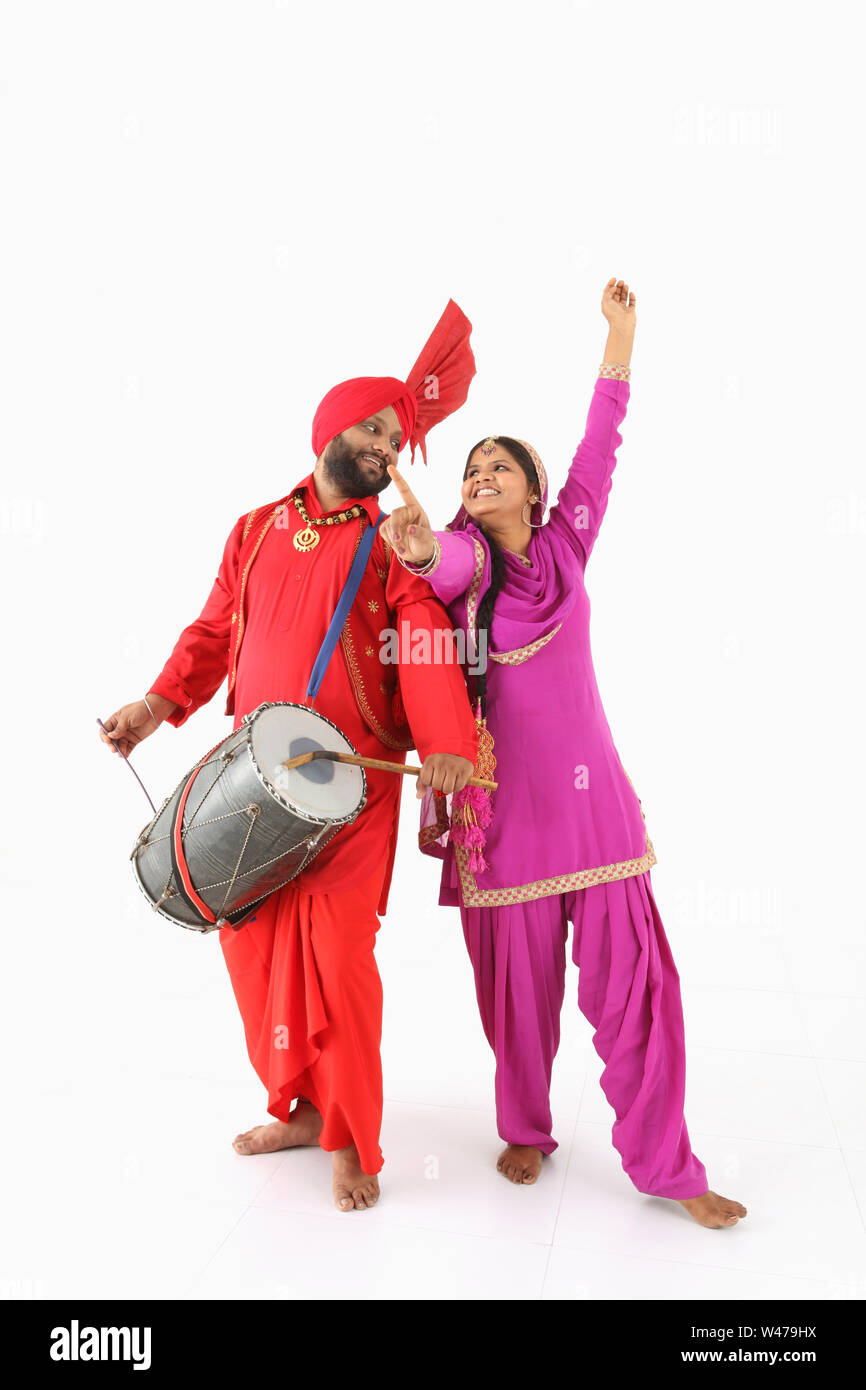 Punjabi couple Cut Out Stock Images & Pictures - Alamy