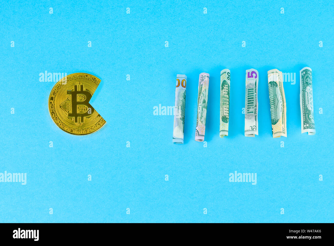 Bitcoin eating dollar. For articles or publications : Bitcoin vs USD dollar,  Is Strong,Stable and Better Than Gold and other currencies.Copy space for  Stock Photo - Alamy