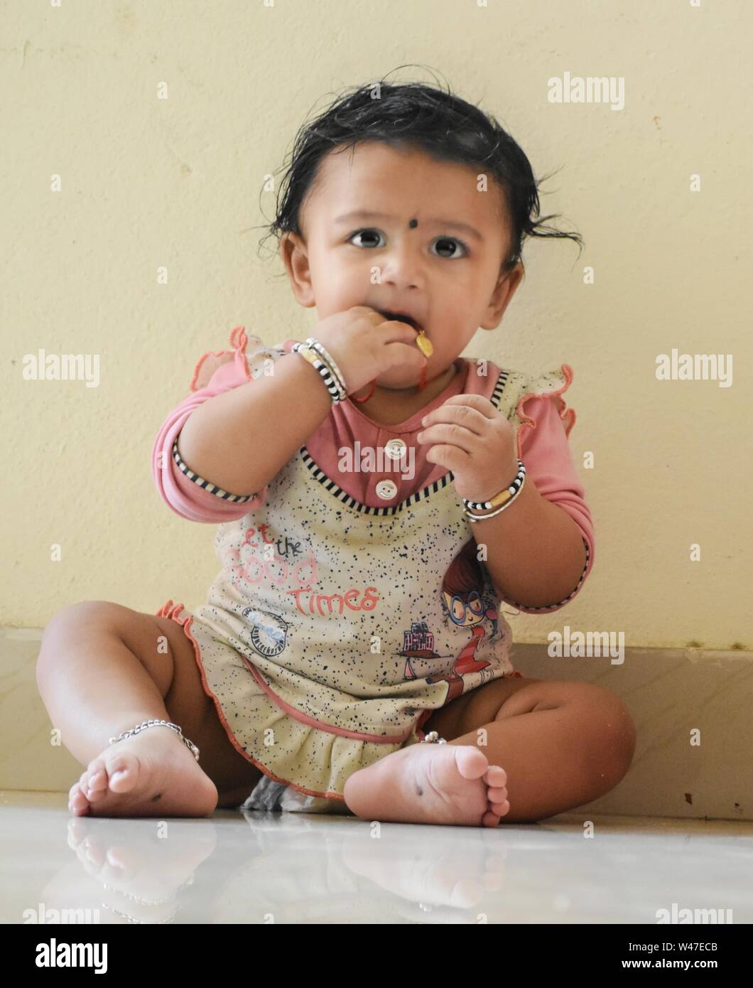 A cute little baby girl in joy mood Stock Photo