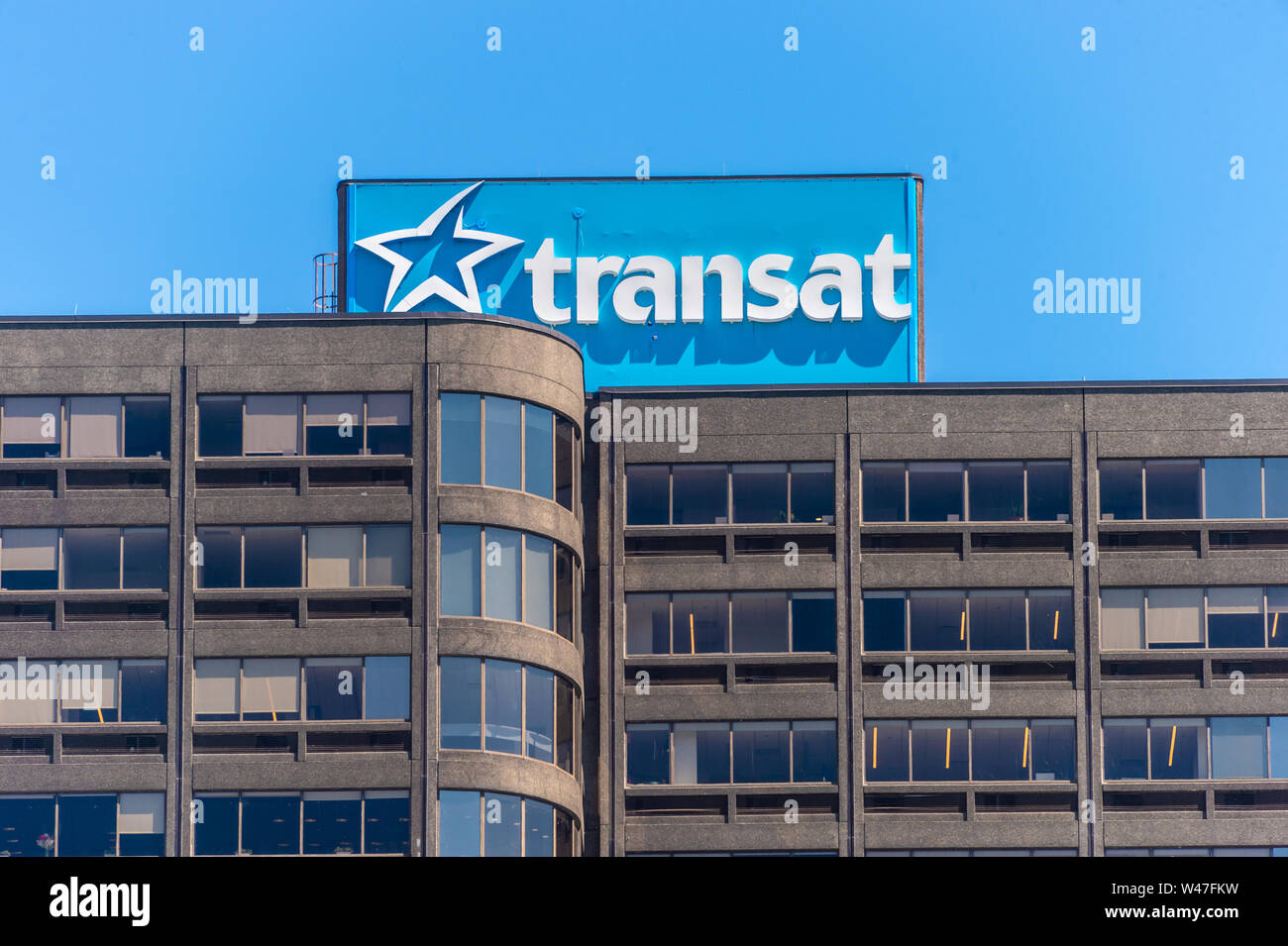 Montreal, CA - 7 July 2019: Air Transat Sign at the top of Air Transat tower. Stock Photo
