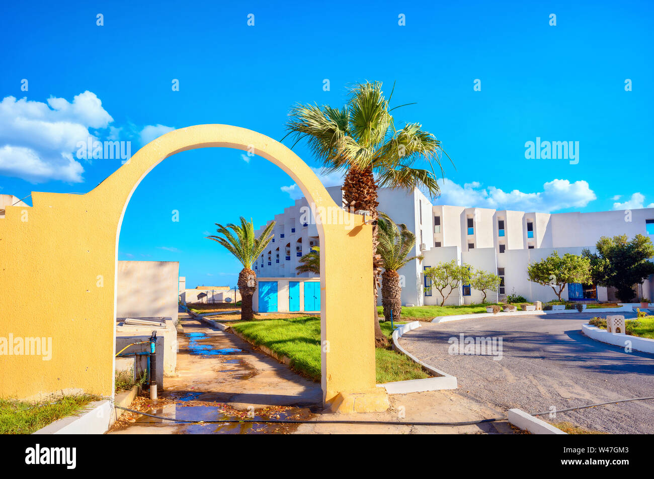 Landscape with modern hotel in coastal resort town. Nabeul, Tunisia, North Africa Stock Photo