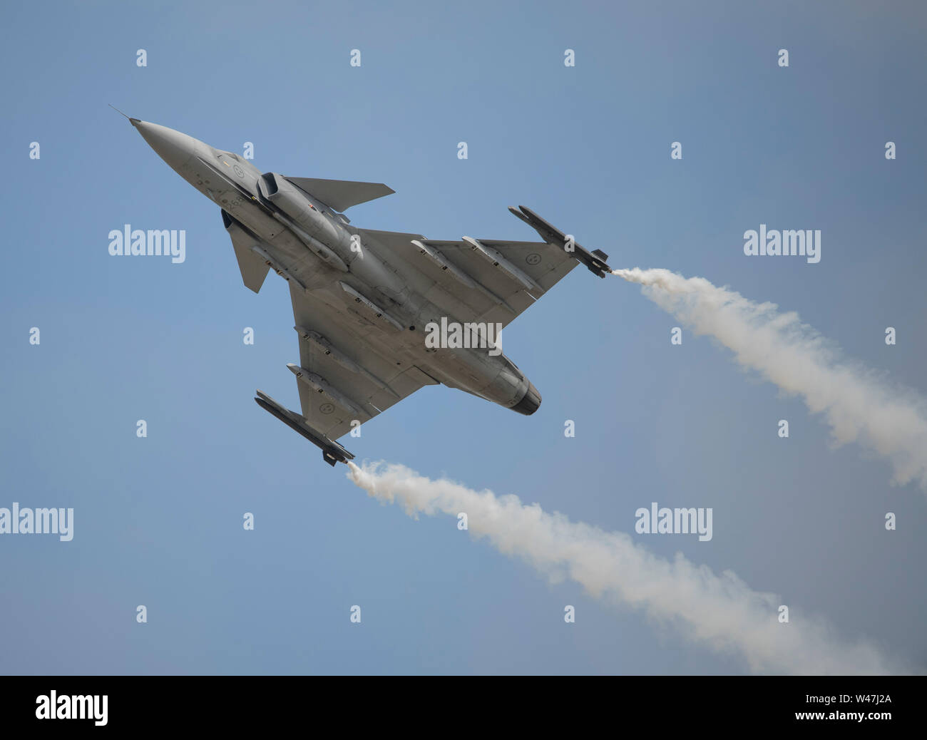 RAF Fairford, Glos, UK. 20th July 2019. Day 2 of The Royal International Air Tattoo (RIAT) with military aircraft from around the world assembling for the world’s greatest airshow with a full flying display in good weather. Image: Saab JAS 39C Gripen flying display from the Swedish Air Force. Credit: Malcolm Park/Alamy Live News. Stock Photo