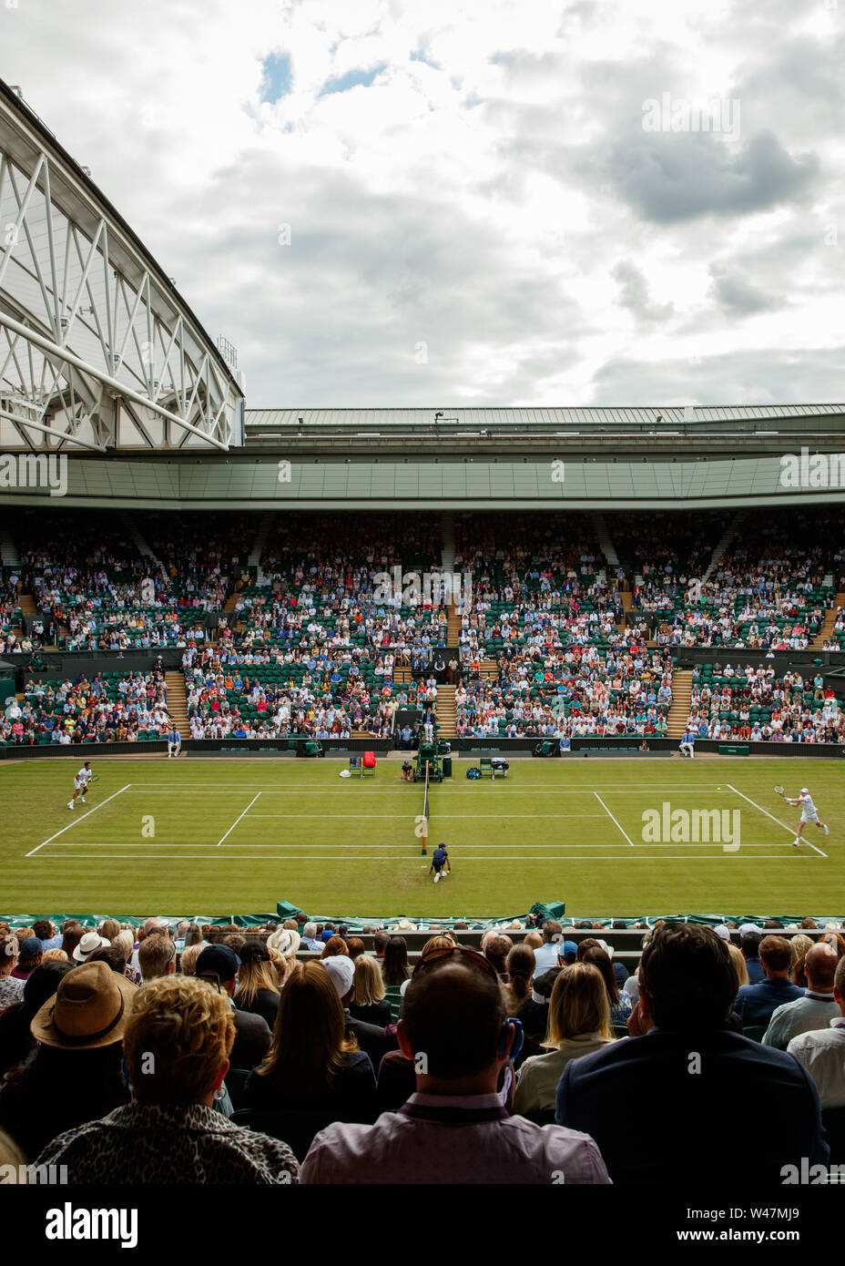 General View of Kyle Edmund and Jaume Munar on Centre Court at The Wimbledon Championships 2019. Held at The All England Lawn Tennis Club, Wimbledon. Stock Photo