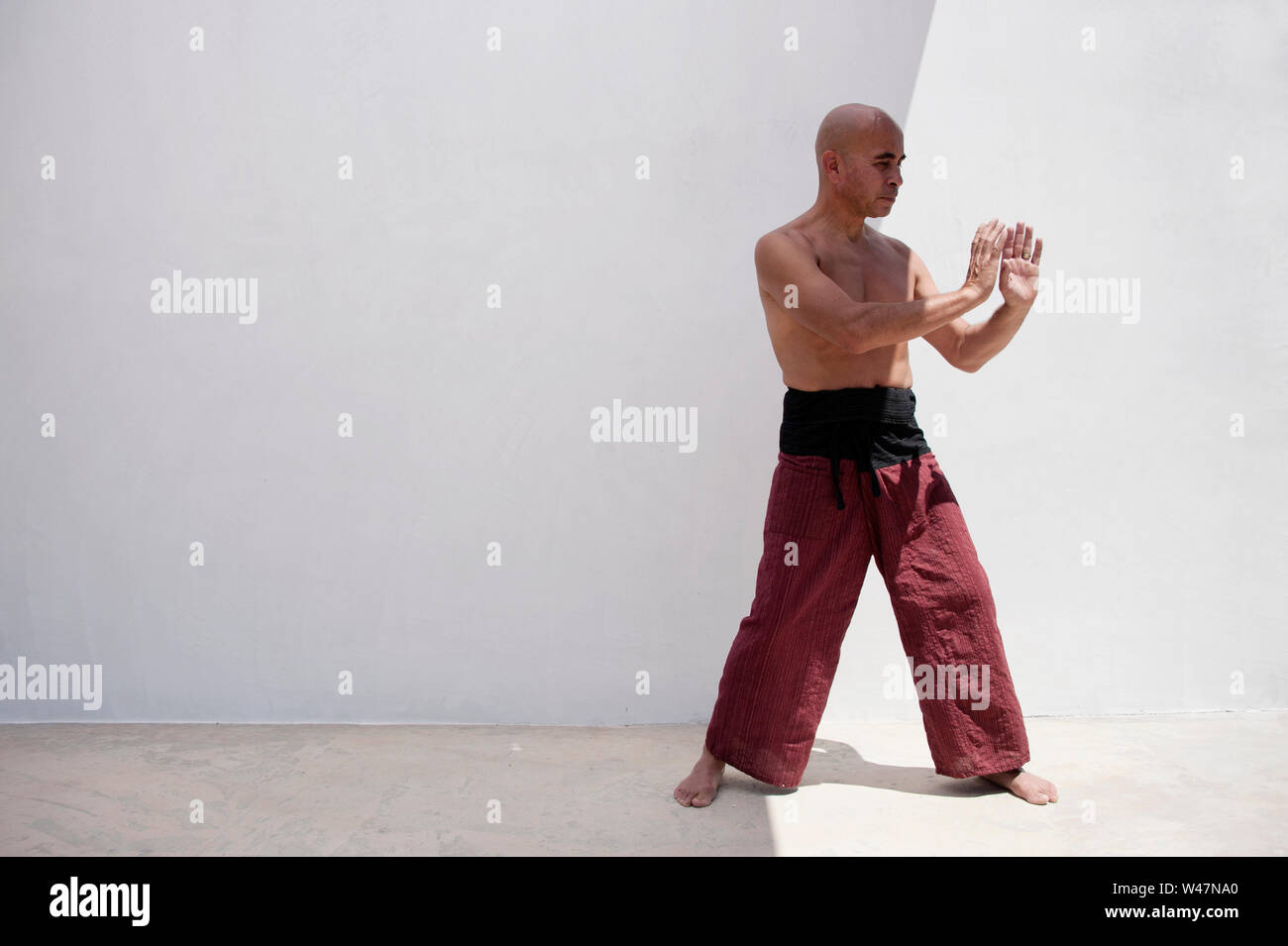 Martial Arts man practicing mindfulness exercises to harmonize body mind Stock Photo Alamy