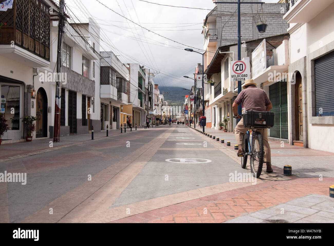 Man on a bicycle in Cotacachi Canton, Imbabura Province, Ecuador in South America Stock Photo
