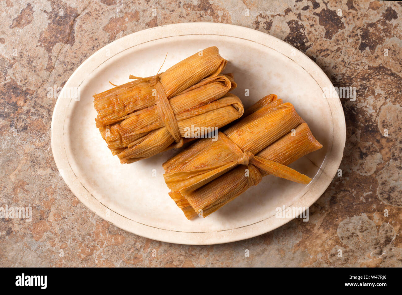Isolated Tamales in Corn Husk Stock Photo Alamy