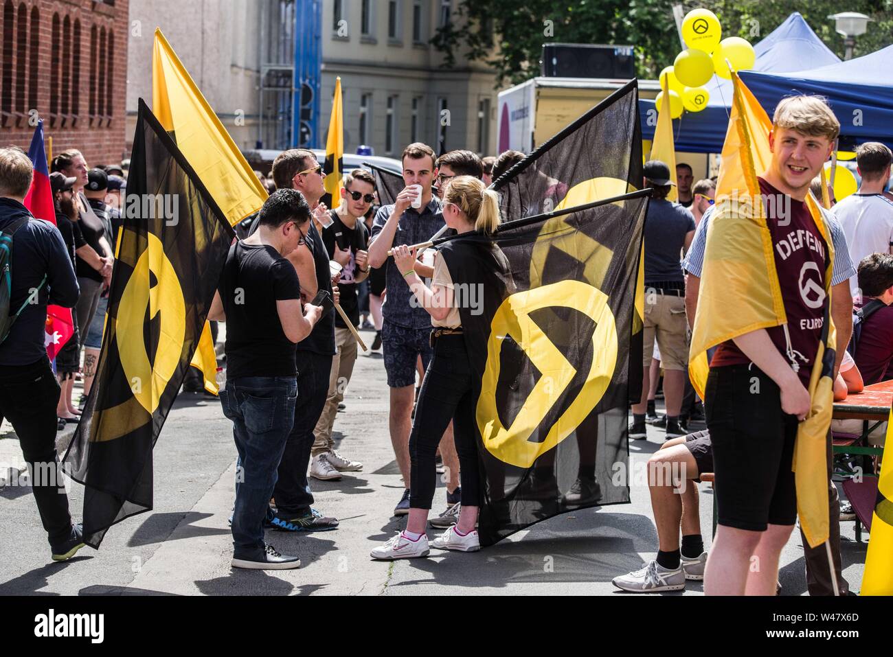 Halle Saale, Sachsen Anhalt, Germany. 20th July, 2019. Amid protests, the white supremacist, right extremist Identitaere Bewegung (Generation Identity, Identitaren Movement) held a rally in Halle (Saale). The Identitaere have recently faced numerous challenges, including raids to explore the connection of its head Martin Sellner to the Christ Church shooter, as well as in Germany where the IB was officially classified as 'right-extremist''. The group has renewed the use of the 'blood and soil'' (Blut und Boden) theories and espouses a 'great replacement'' of white people, which was Stock Photo