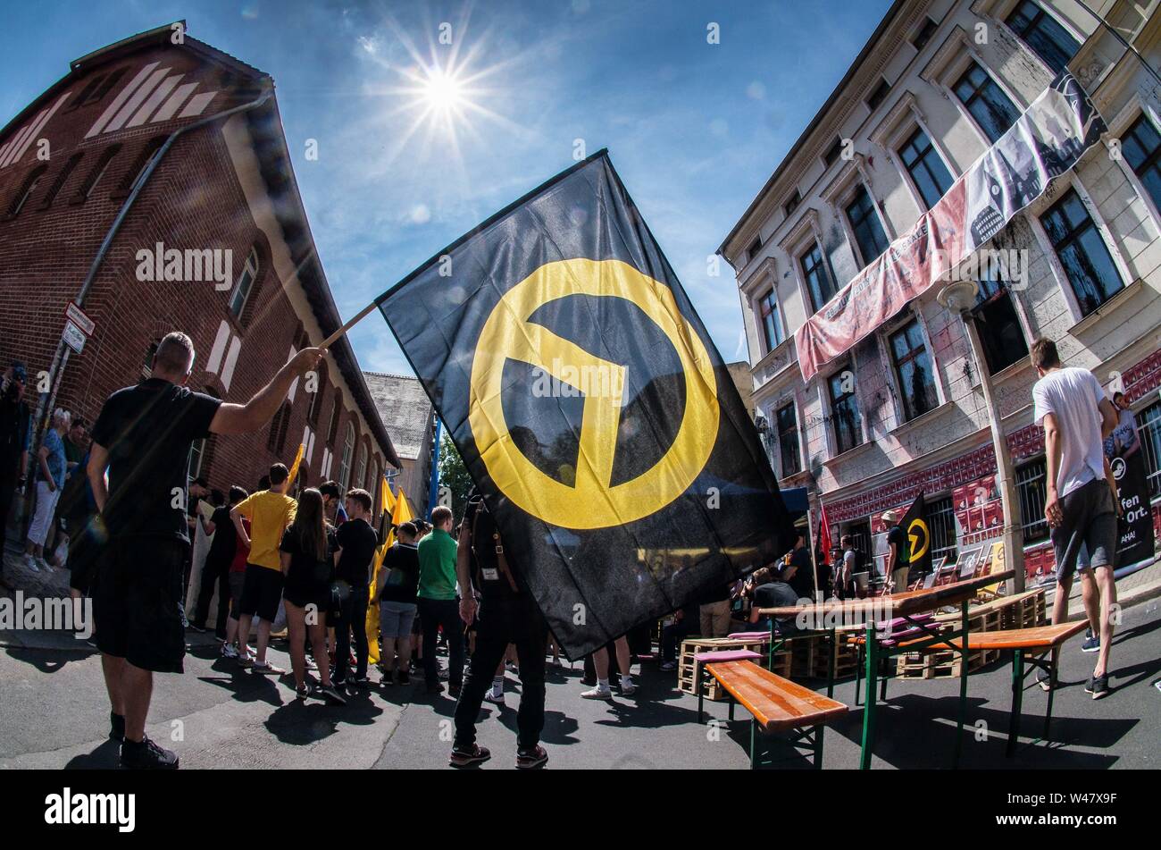 Halle Saale, Sachsen Anhalt, Germany. 20th July, 2019. Amid protests, the white supremacist, right extremist Identitaere Bewegung (Generation Identity, Identitaren Movement) held a rally in Halle (Saale). The Identitaere have recently faced numerous challenges, including raids to explore the connection of its head Martin Sellner to the Christ Church shooter, as well as in Germany where the IB was officially classified as 'right-extremist''. The group has renewed the use of the 'blood and soil'' (Blut und Boden) theories and espouses a 'great replacement'' of white people, which was Stock Photo