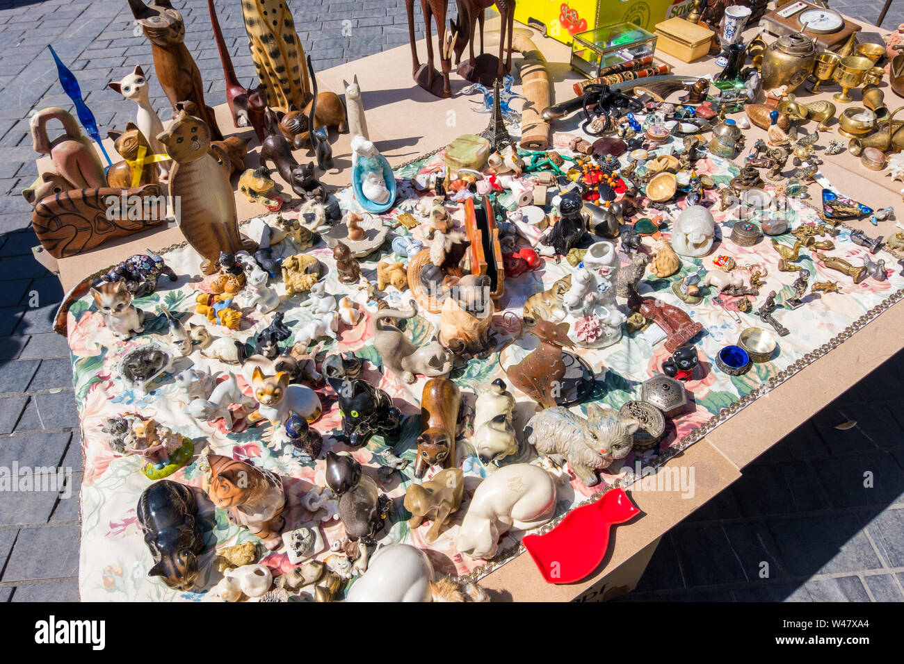 Bordeaux, France - May 5, 2019: Collections of old toys and figurines of cats and ducks on a famous Bordeaux flea market Marche Aux Puces Stock Photo