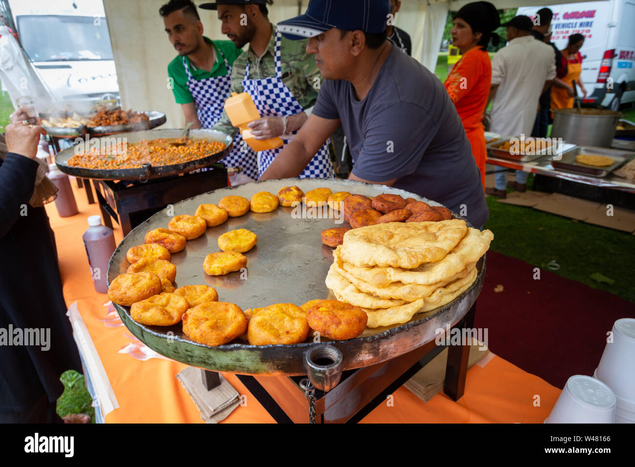 Indian street food being made and served in a stall in Smethwick, UK