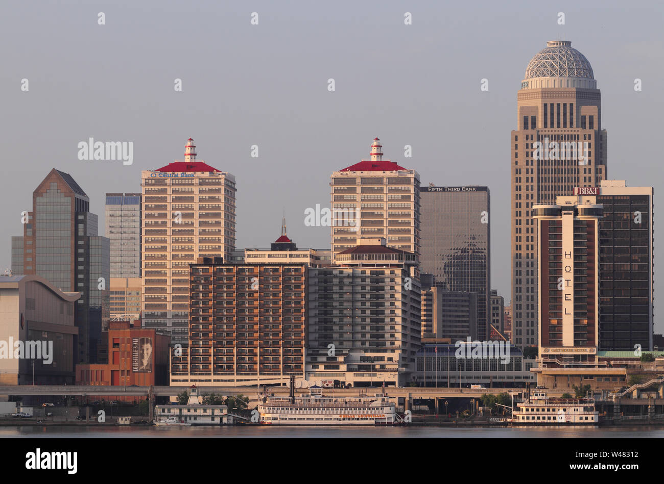 Louisville - Circa July 2019: Louisville downtown at sunrise, including the Mercer, BB&T, Galt House, PNC and Fifth Third Bank buildings and waterfron Stock Photo
