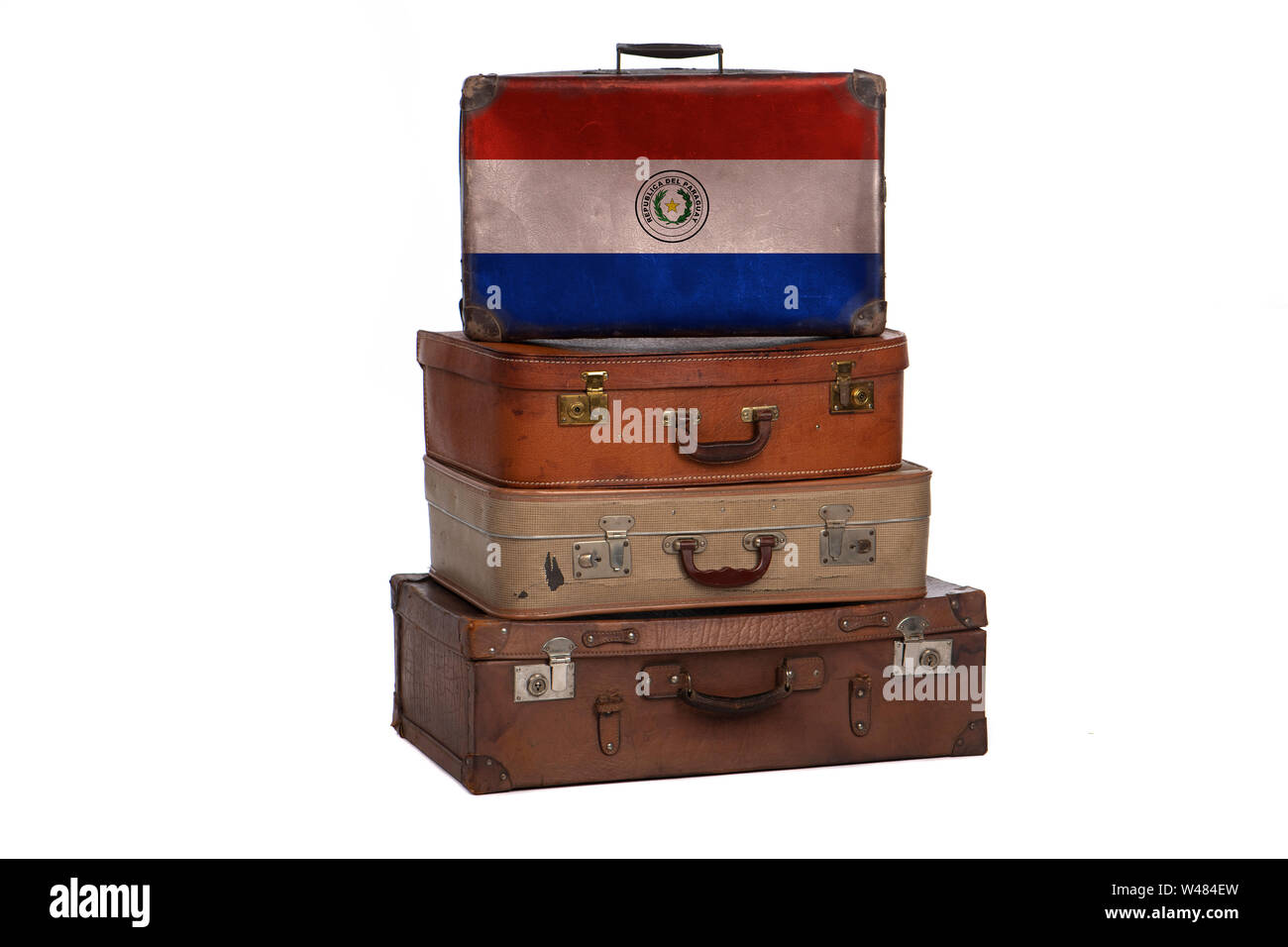 Paraguay, Paraguayan travel concept. Group of vintage suitcases isolated on white background Stock Photo