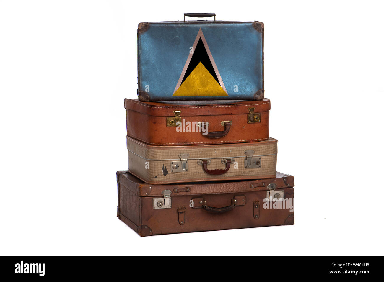 Saint Lucia travel concept. Group of vintage suitcases isolated on white background Stock Photo
