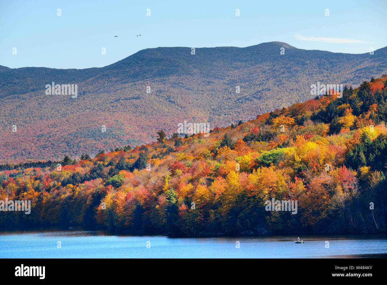 Lake with Autumn foliage and mountains in New England Stowe Stock Photo ...