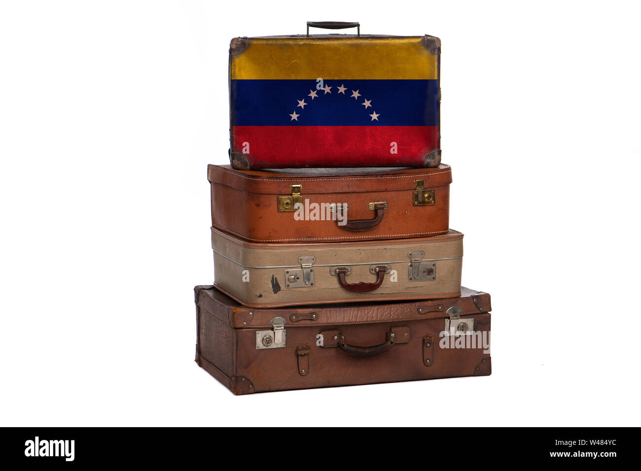 Venezuela, Venezuelan travel concept. Group of vintage suitcases isolated on white background Stock Photo