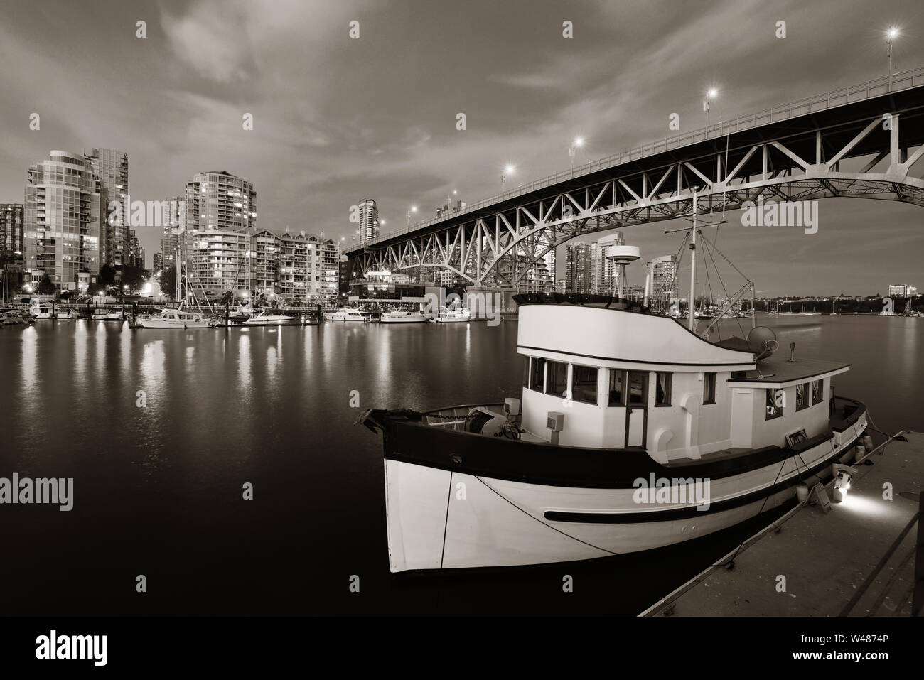 Vancouver False Creek at night with bridge and boat Stock Photo - Alamy