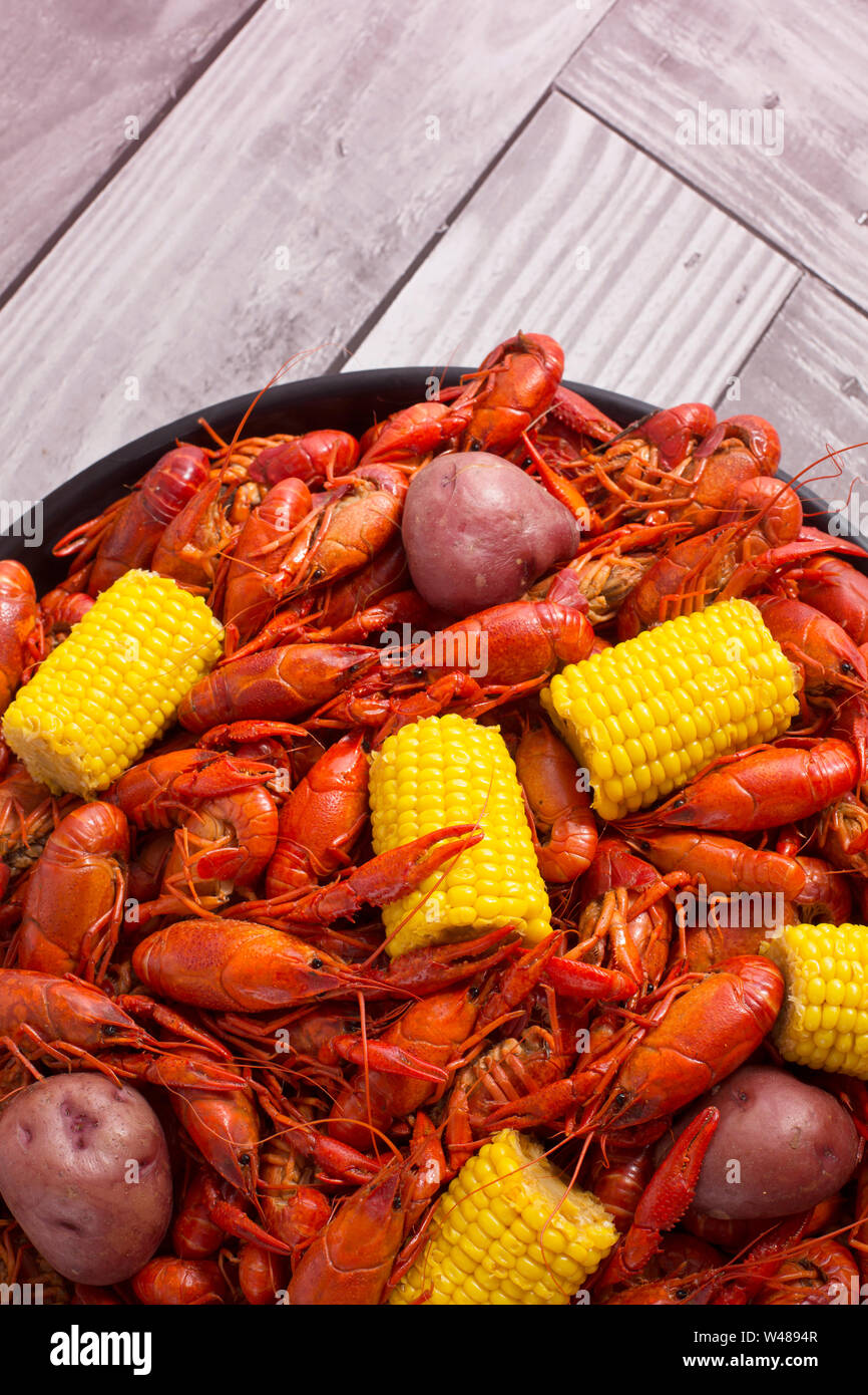 Boiled Crawfish Served With Corn Potatoes And Sausage Stock Photo Alamy
