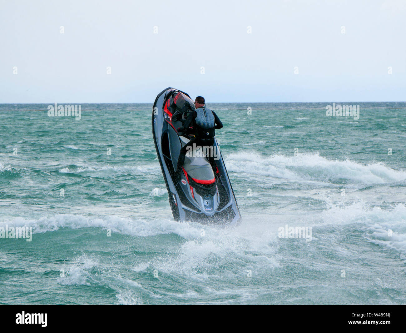 Man riding personal watercraft view from Navy Pier, Chicago, Illinois. Stock Photo