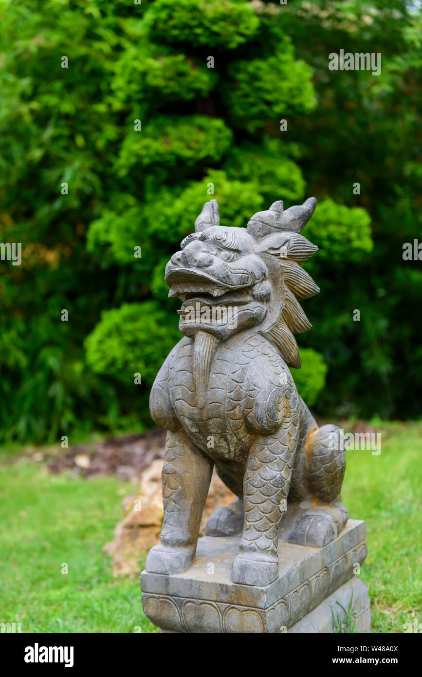 Figurine of the "Chinese Dragon" in the form of a lion, or a dog Stock