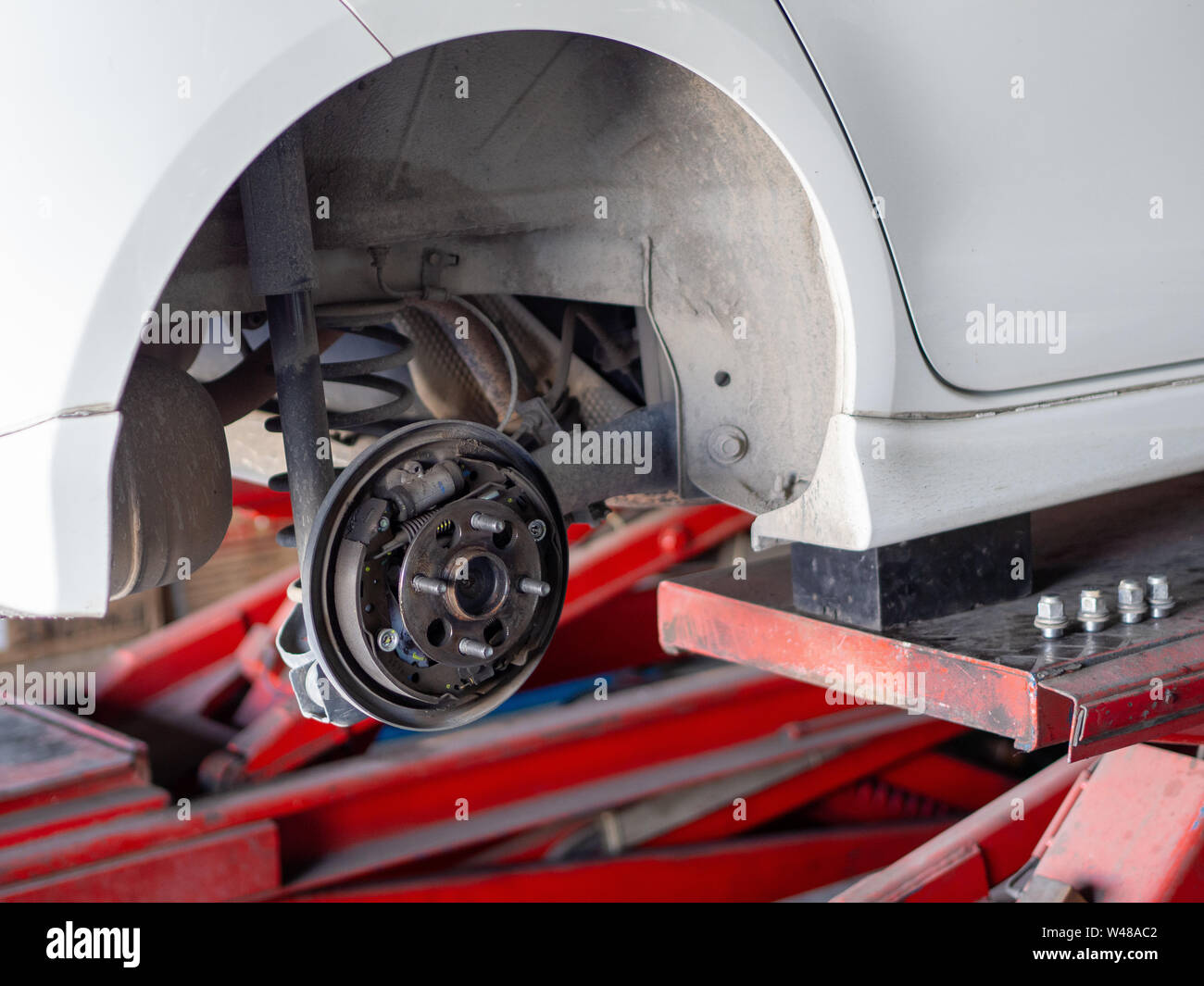 Car wheel arch without wheel Stock Photo