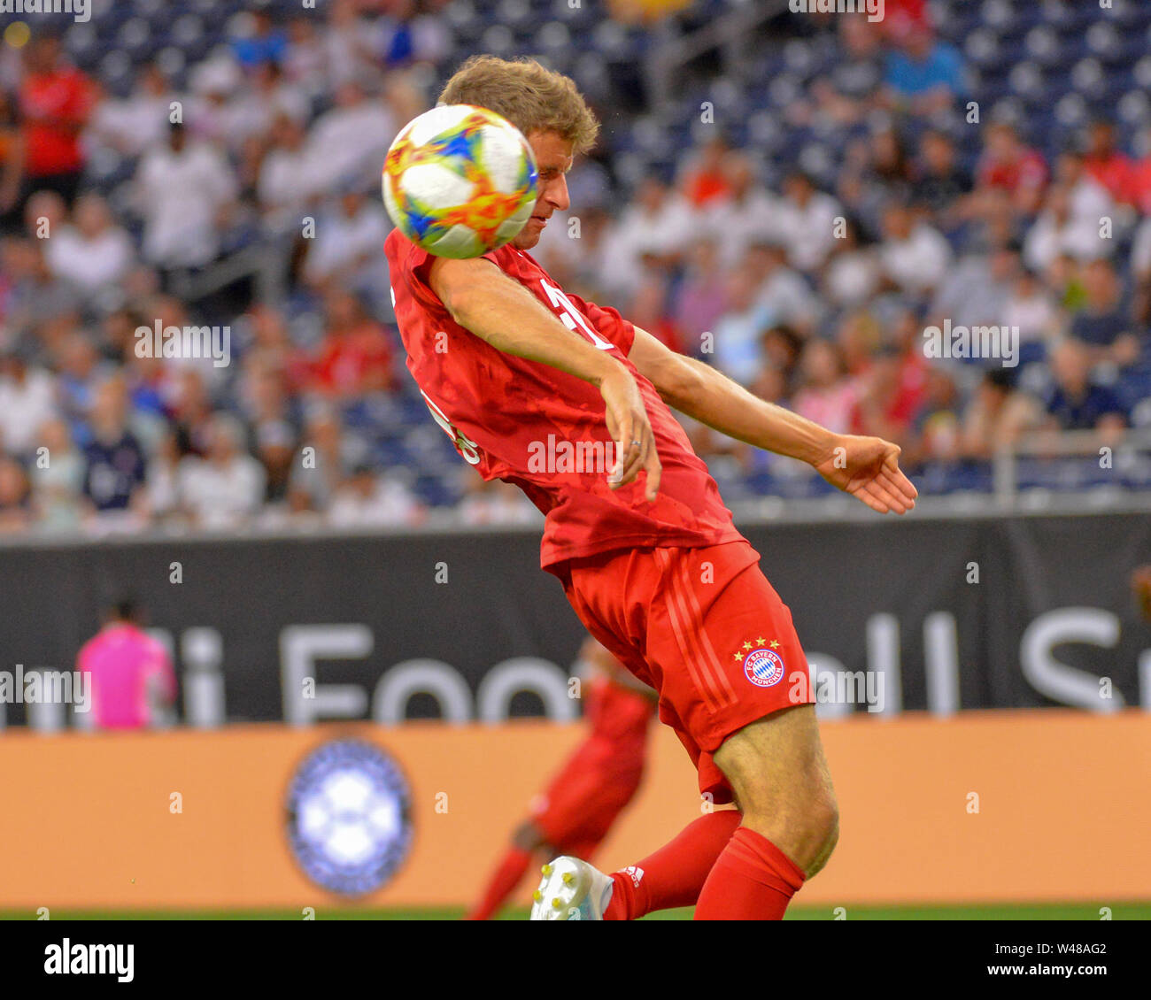 Houston, TX, USA. 20th July, 2019. Bayern forward, Thomas Muller (25), goes up to head the ball during the 2019 International Champions Cup match between Real Madrid and FC Bayern, at NRG Stadium in Houston, TX. FC Bayern defeated Real Madrid, 3-1. Mandatory Credit: Kevin Langley/Sports South Media/CSM/Alamy Live News Stock Photo