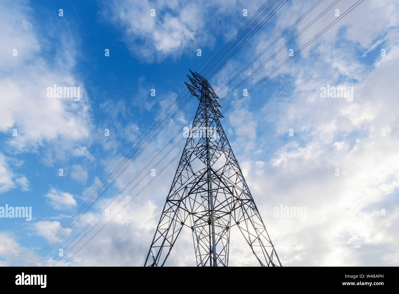 high voltage pole with blue sky Stock Photo - Alamy