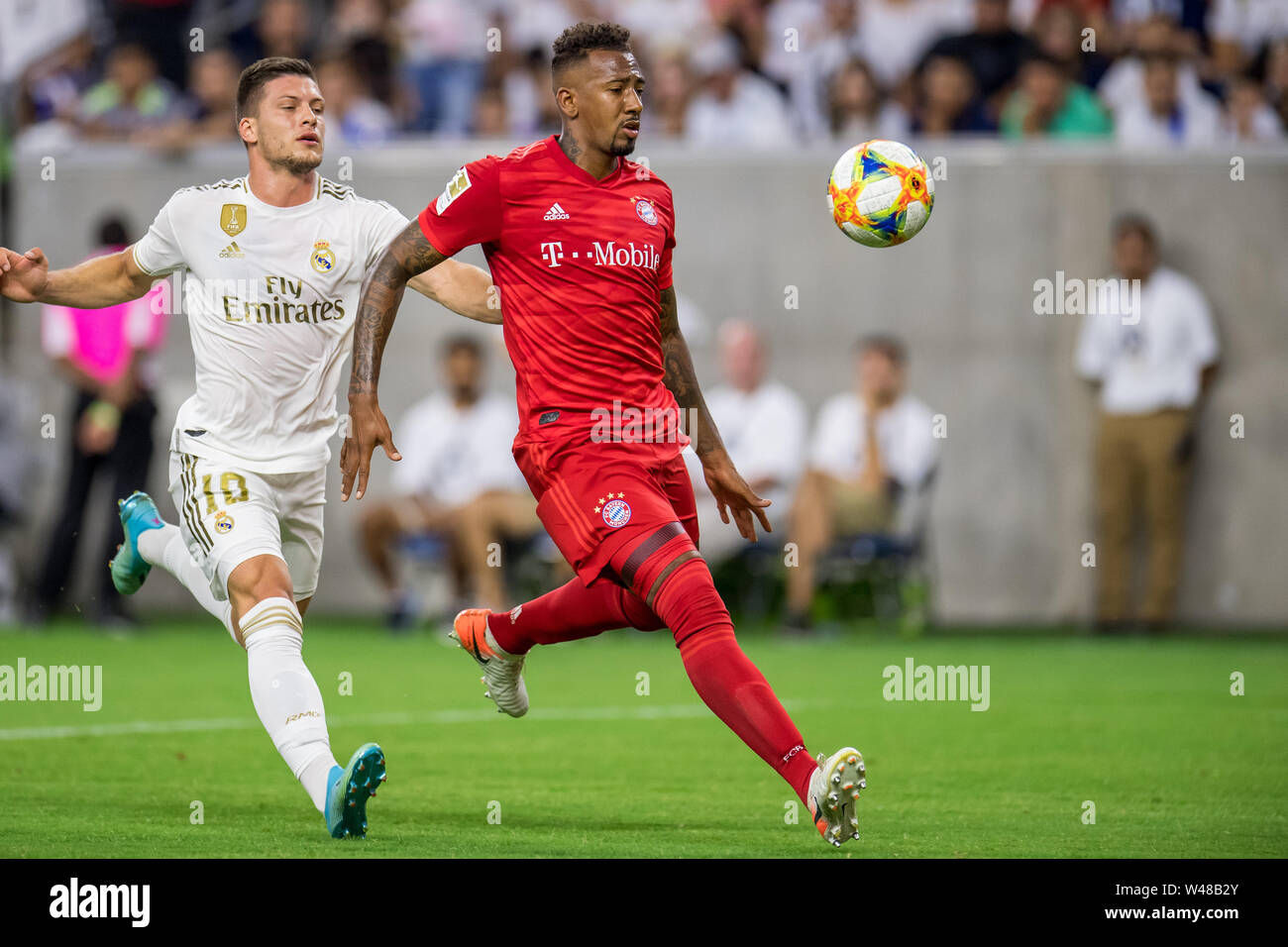 Houston, TX, USA. 20th July, 2019. Bayern Munich defender Jerome Boateng (17) shields the ball from Real Madrid forward Luka Jovic (18) during the second half of an International Champions Cup soccer match between FC Bayern Munich and Real Madrid at NRG Stadium in Houston, TX. FC Bayern won the game 3 to 1.Trask Smith/CSM/Alamy Live News Stock Photo