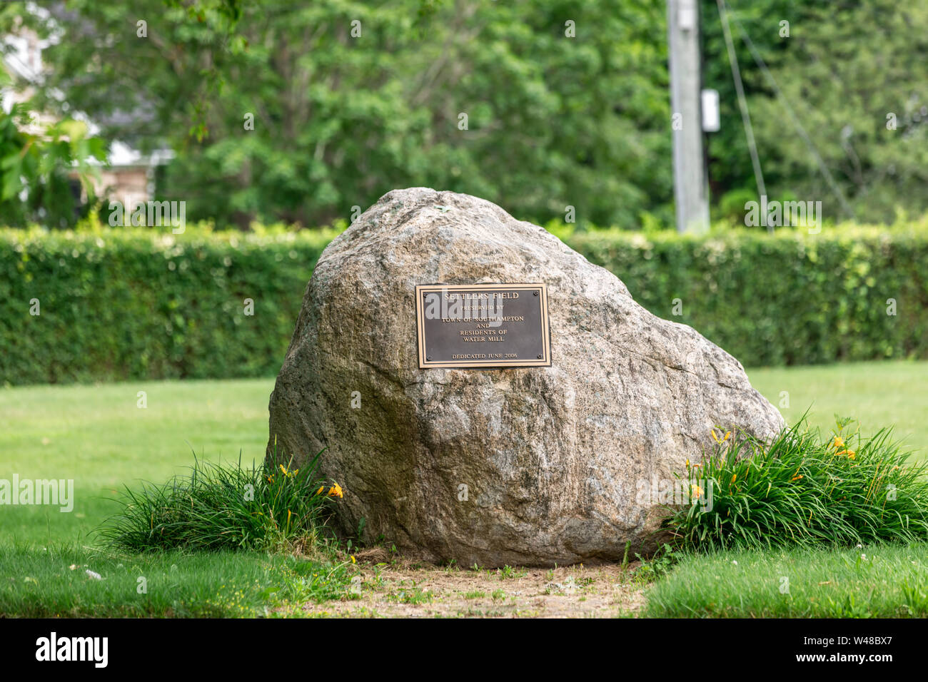 Plaque on a large rock in Water Mill, NY Stock Photo