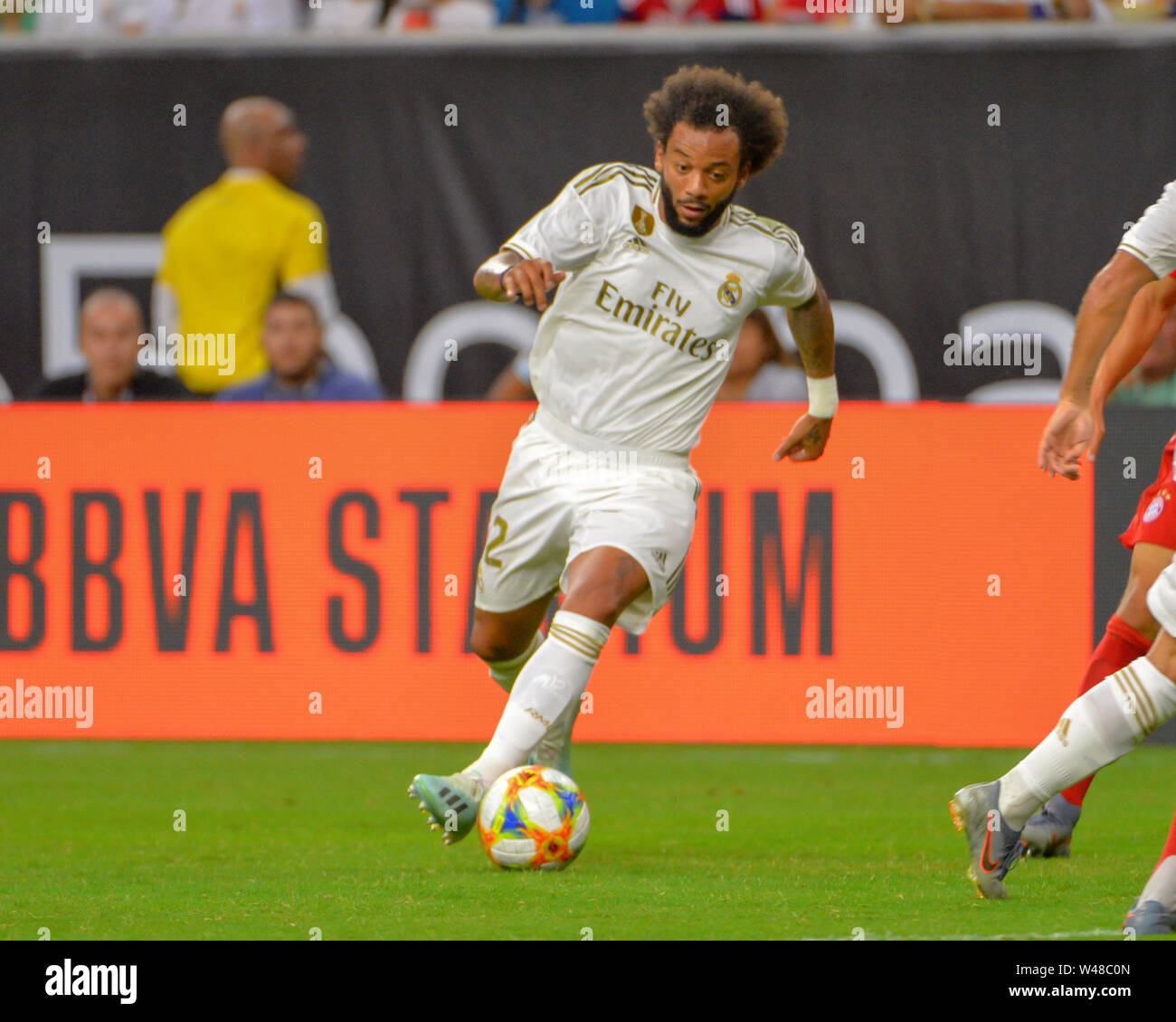 Houston, TX, USA. 20th July, 2019. Real Madrid defender, Marcelo Vieira (12), moves the ball downfield during the 2019 International Champions Cup match between Real Madrid and FC Bayern, at NRG Stadium in Houston, TX. FC Bayern defeated Real Madrid, 3-1. Mandatory Credit: Kevin Langley/Sports South Media/CSM/Alamy Live News Stock Photo
