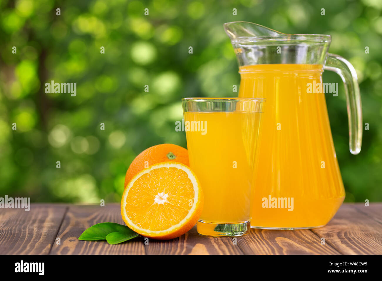 Jug with orange juice isolated on white Stock Photo by ©alphacell 64390533