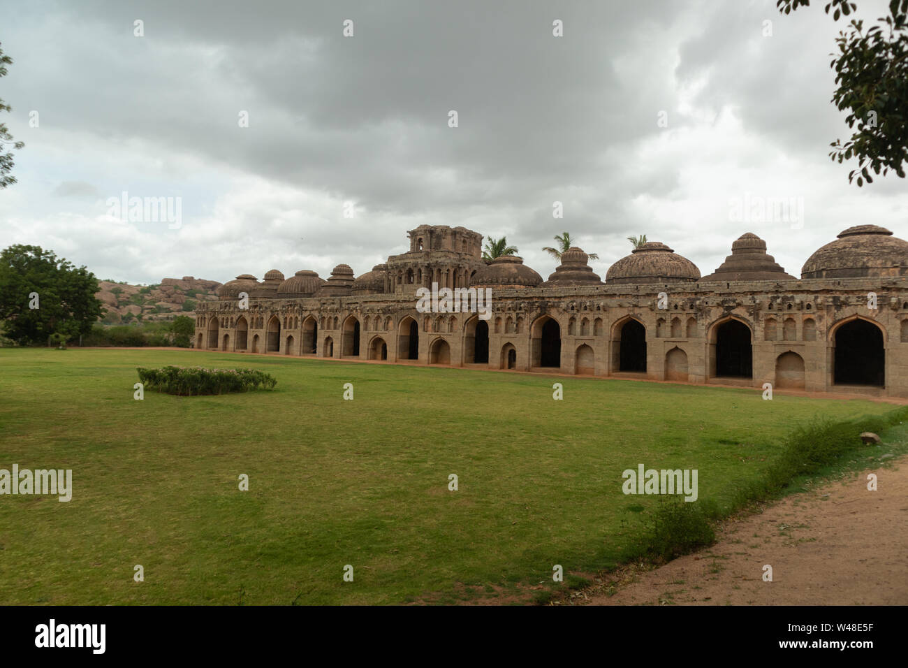 Ruins of the Elephant Stable inside Zanana enclosure at Hampi from 14th century Vijayanagara kingdom at Hampi, Karnataka,India Stock Photo