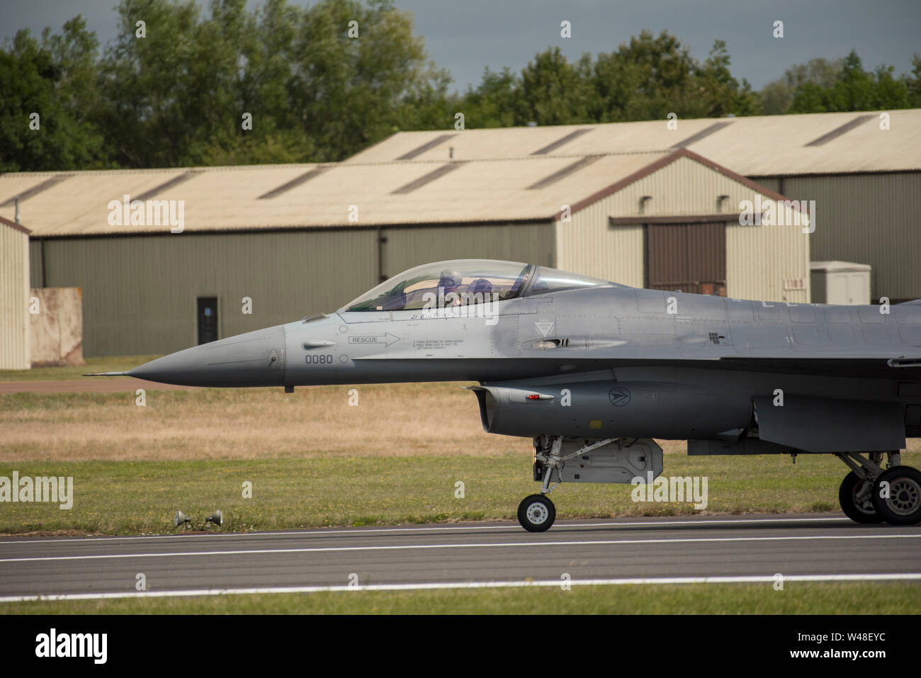 A member of the U.S. Air Force’s F-16 Viper Demonstration Team taxis on the runway during the 2019 Royal International Air Tattoo at RAF Fairford, England, July 20, 2019. This year, RIAT commemorated the 70th anniversary of NATO and highlighted the United States' enduring commitment to its European allies. (U.S. Air Force photo by Tech Sgt. Aaron Thomasson) Stock Photo