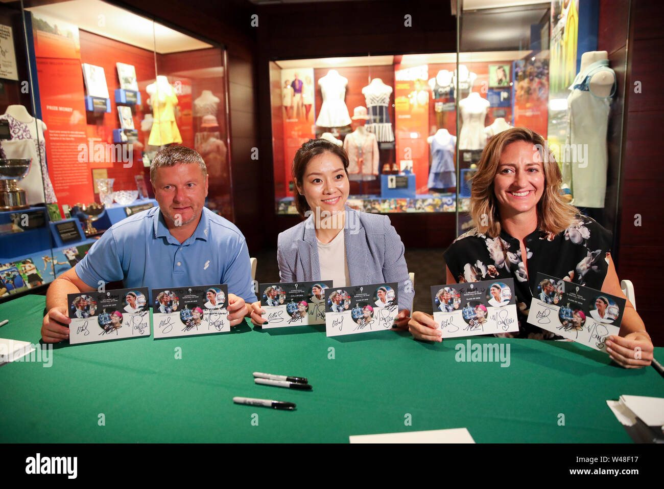 Rhode Island, USA. 20th July, 2019. Mary Pierce (R) of France, Li Na (C) of China and Yevgeny Kafelnikov of Russia show their signed autographs before the induction ceremony of the International Tennis Hall of Fame in Newport of Rhode Island, the United States, July 20, 2019. Credit: Wang Ying/Xinhua/Alamy Live News Stock Photo