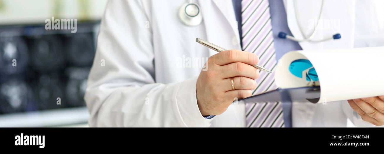 Doctor. Check Grade Male doctor checking medicine prescription hi-res stock photography and ...