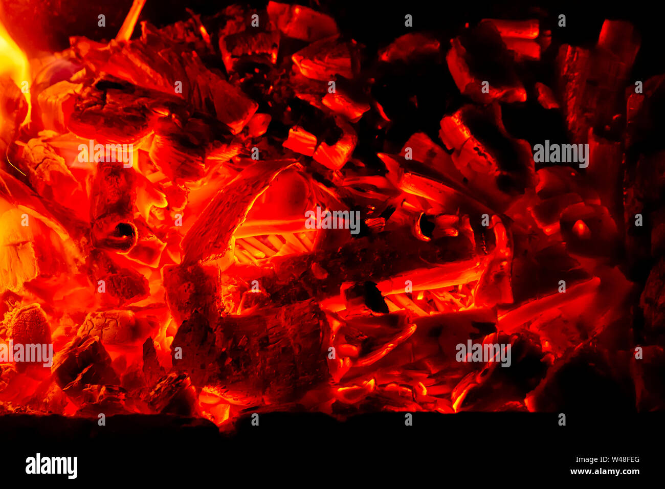 Wallpaper with a bright fire inside the brazier. Flame of fire ...