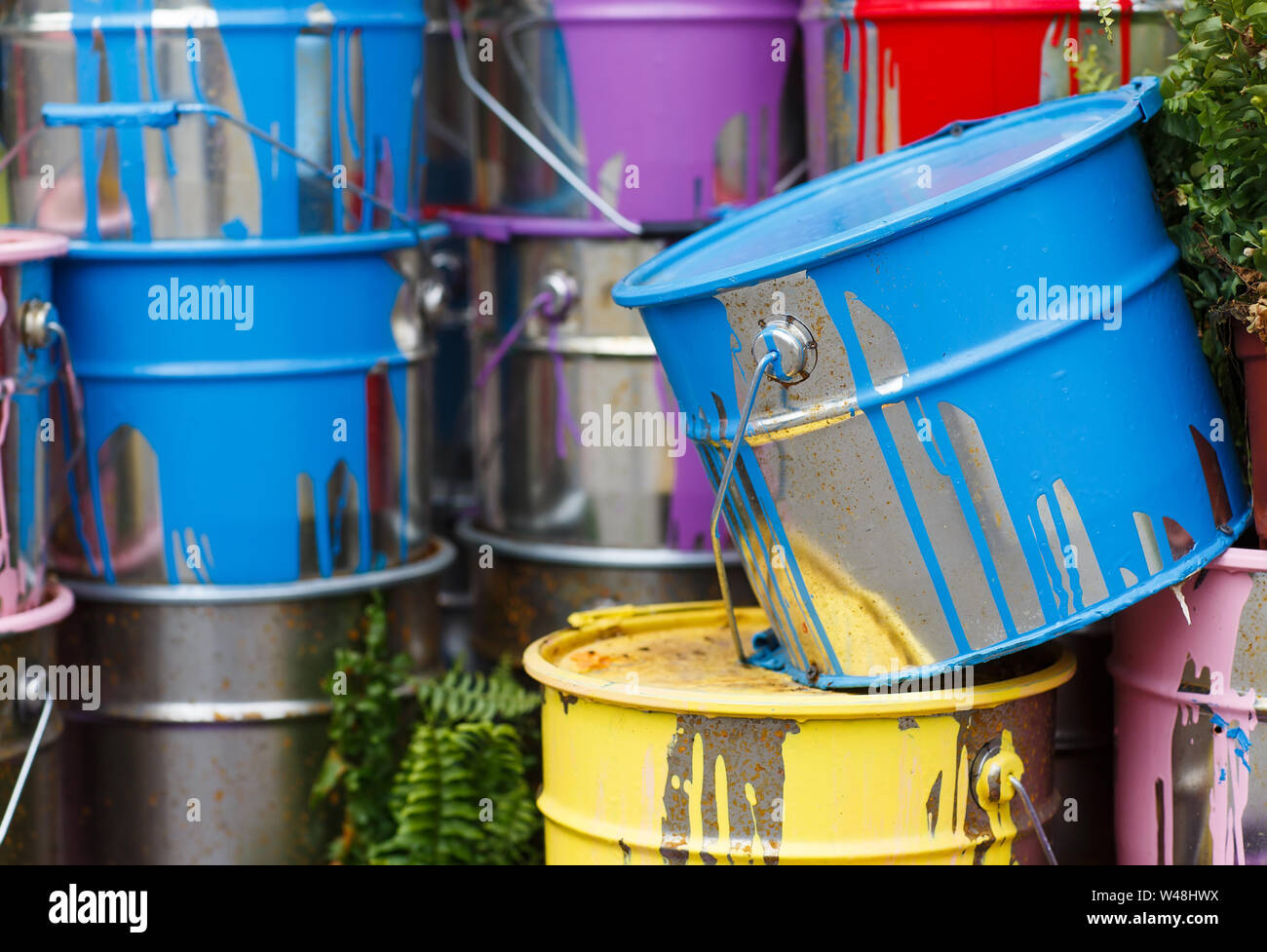 The used paint cans. Colorful paint buckets Stock Photo Alamy