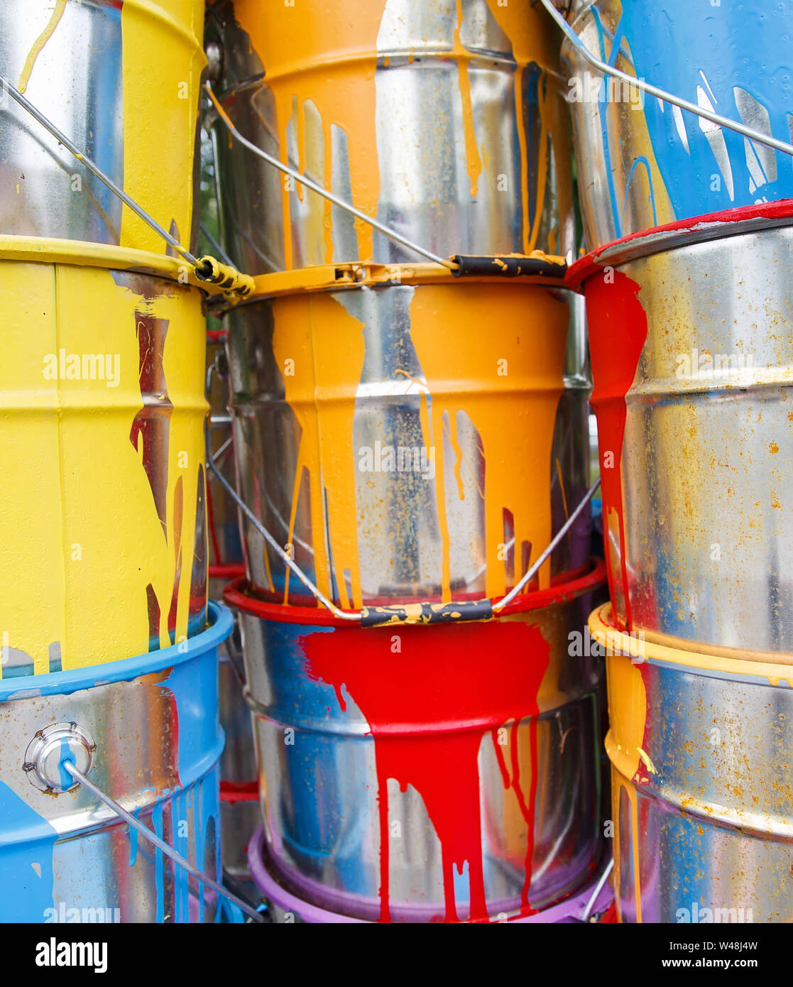 The used paint cans. Colorful paint buckets Stock Photo Alamy