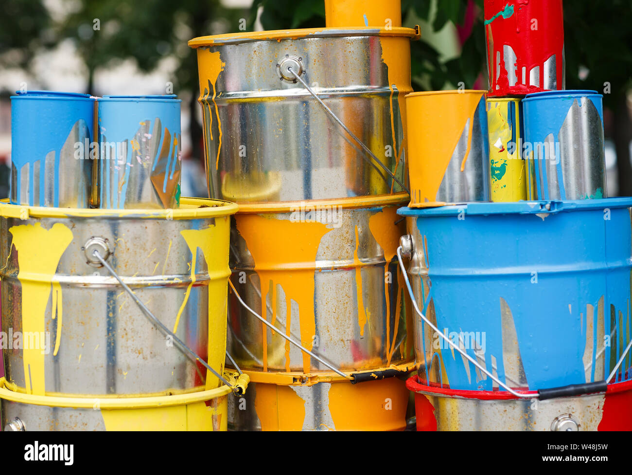 The used paint cans. Colorful paint buckets Stock Photo Alamy