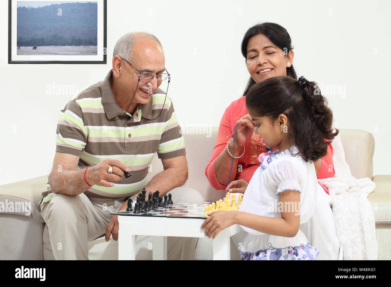Teenager Playing Chess with his Grandfather · Free Stock Photo