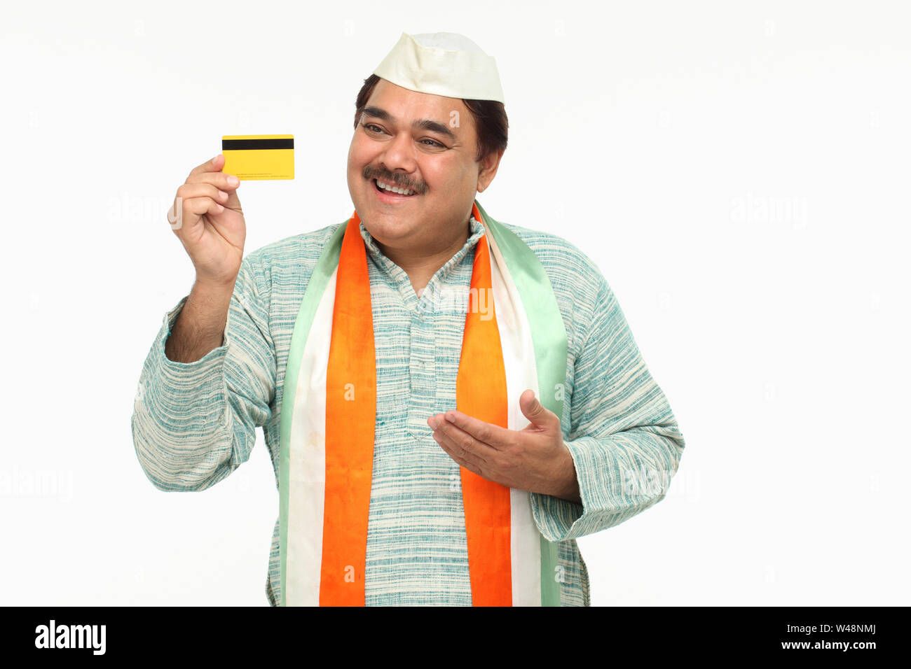 Indian politician showing a credit card and smiling Stock Photo - Alamy