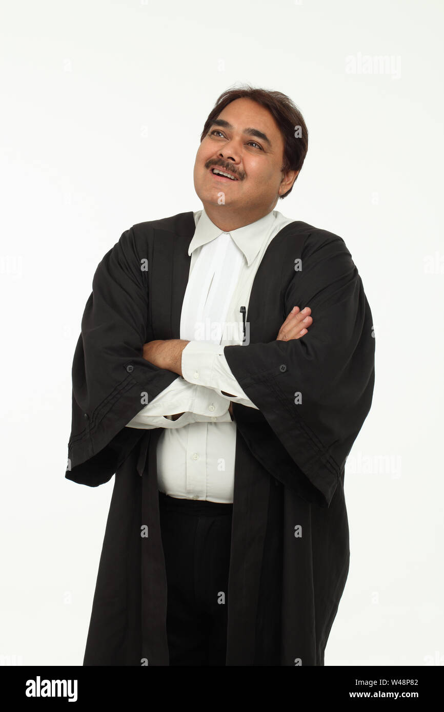 Indian lawyer smiling with his arms crossed Stock Photo