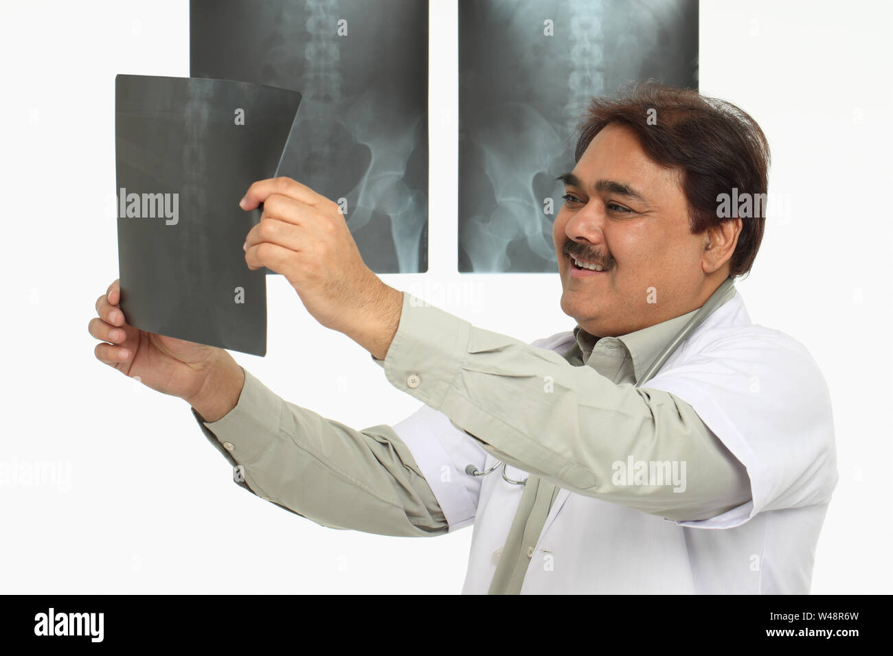 Indian man male doctor x ray examining Cut Out Stock Images & Pictures ...