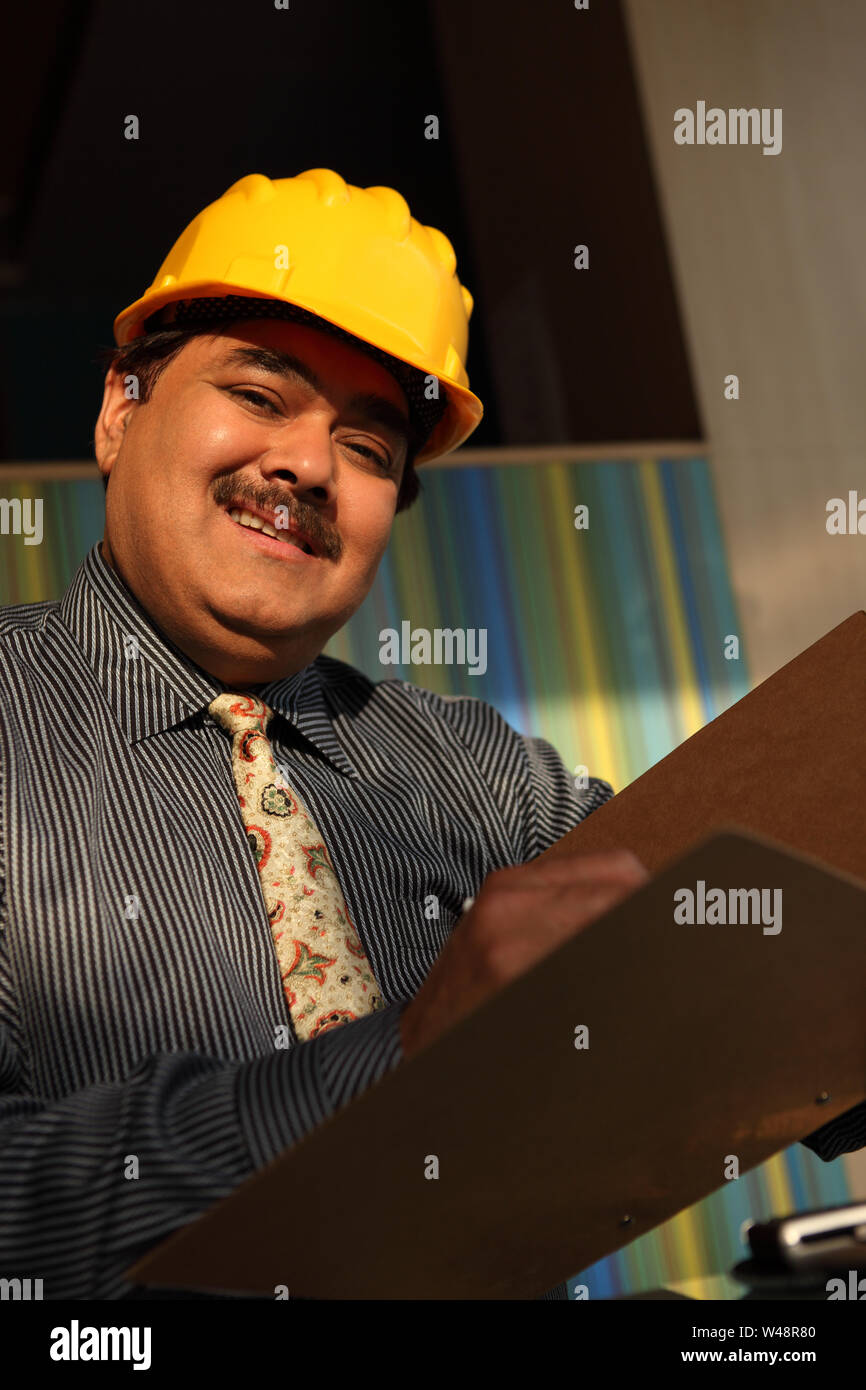 Architect doing paperwork Stock Photo