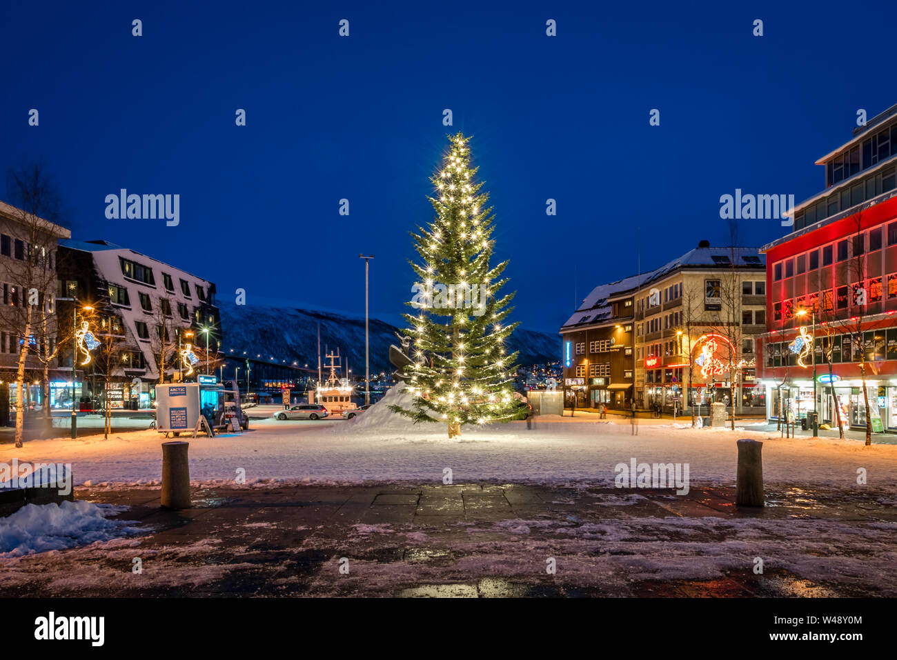 Tromso, Norway -  December 2018 : Huge Christmas tree, lights and decorations in the centre of Tromso town Stock Photo