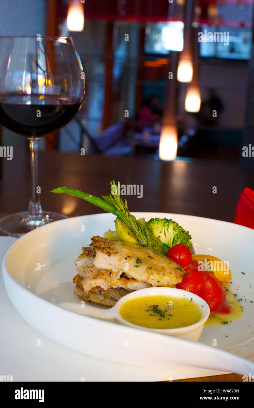 Dish served with red wine Stock Photo Alamy