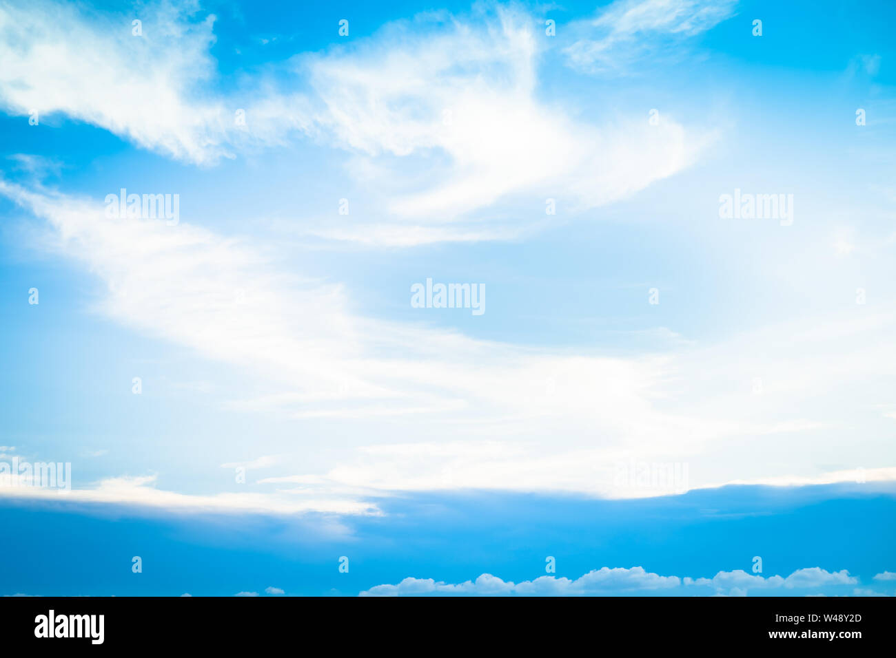 Blue sky with clouds. Natural background Stock Photo - Alamy