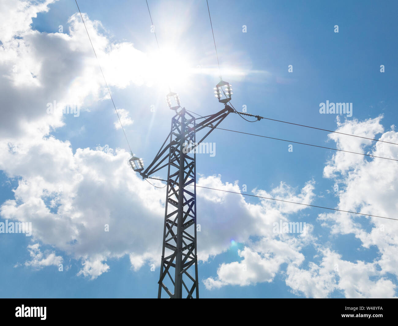 High voltage post or High voltage tower. High voltage towers with sky background Stock Photo