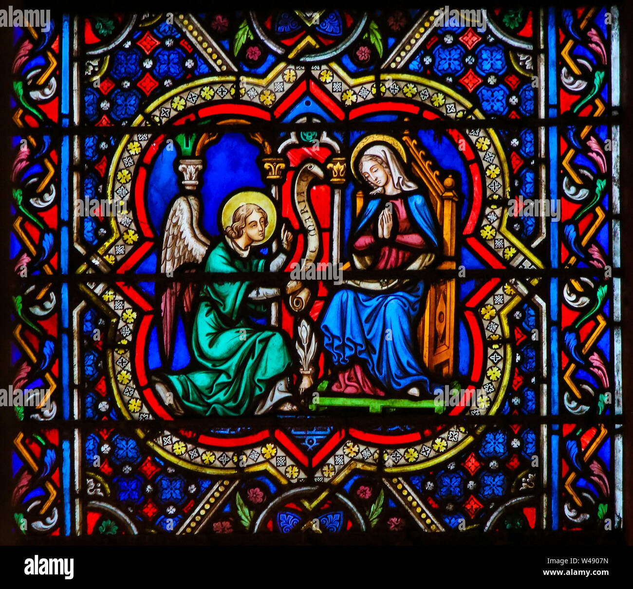 Stained Glass in the Cathedral of Notre Dame, Paris, France, depicting the Annunciation Stock Photo