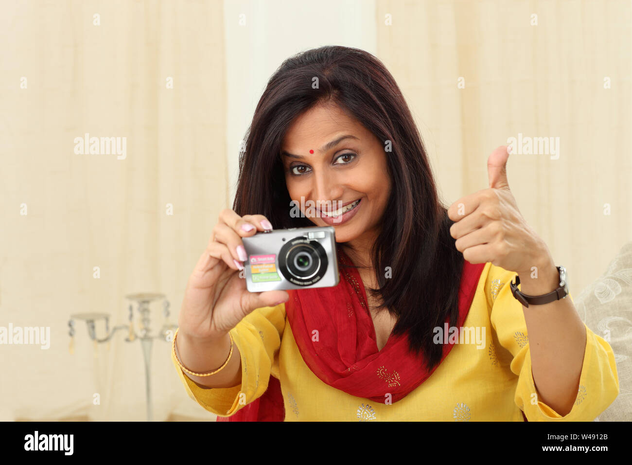 Indian woman housewife thumbs up hi-res stock photography and images ...